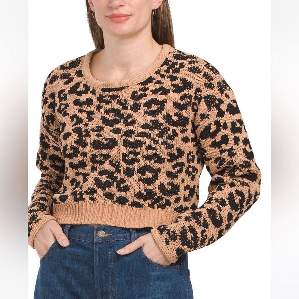 NWT. Long sleeve leopard print sweater. Size M